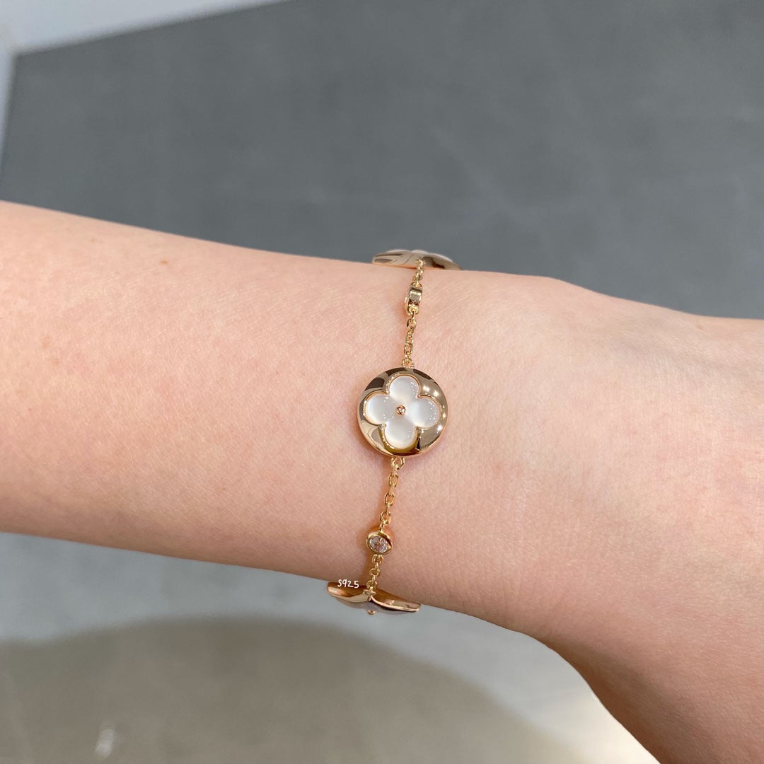 [Regal Jewels]STAR AND SUN 4 MOTIF WHITE MOP PINK GOLD BRACELET