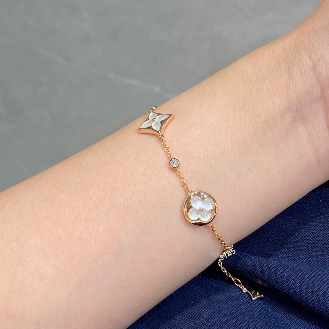 [Regal Jewels]STAR AND SUN 4 MOTIF WHITE MOP PINK GOLD BRACELET