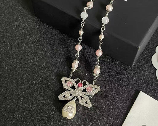 [Regal Jewels] Bow & Pearl Double C Pavé Diamond Necklace